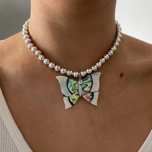 Abalone Butterfly Necklace with row of silver plated row of balls New